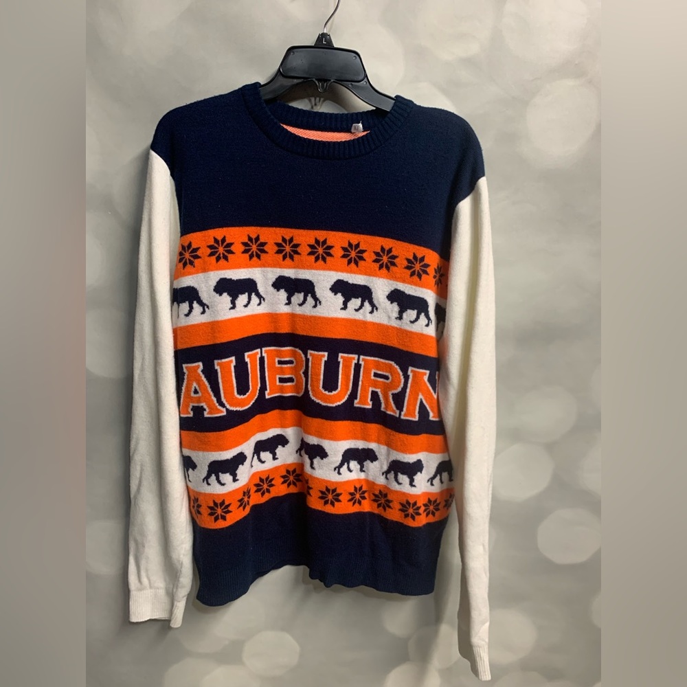 Auburn University rare sweater in XL. This is a great sweater and full of spirit